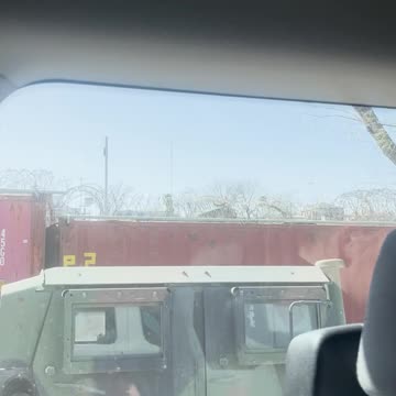Vance's motorcade passes border wall put up by Greg Abbott