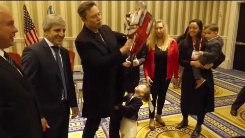 Javier Milei gives a chainsaw to Elon Musk