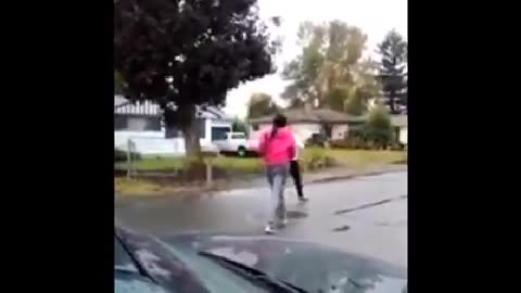 It's Always The One Talking The Most: Girl Rolls Up To Someone's House For A Fight But Gets Beat