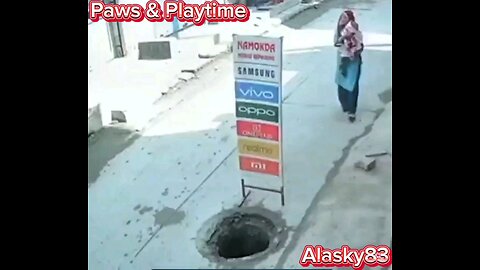 WOMAN AND BABY FALL INTO AN OPEN MANHOLE SHE WAS DISTRACTED TALKING ON HER PHONE