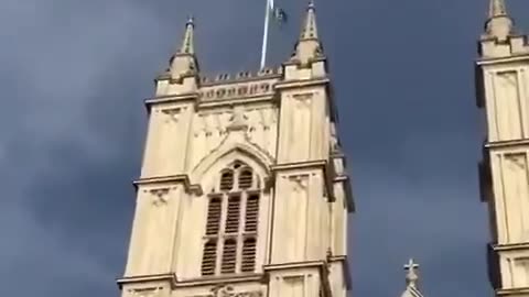 Pakistani flag flies over Westminster Abbey during Holy week. London is under