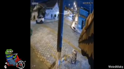 Caught on street camera as a cyclist is thrown into the air for no apparent reason