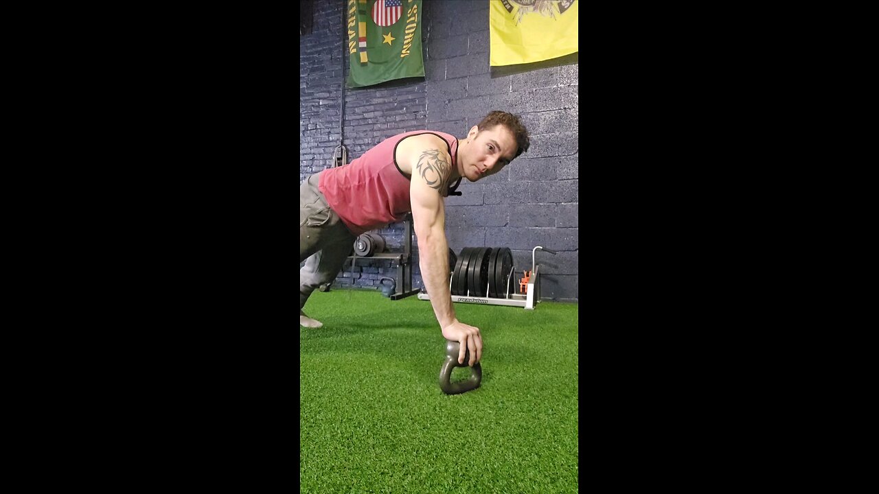 One arm, One kettlebell, two push ups