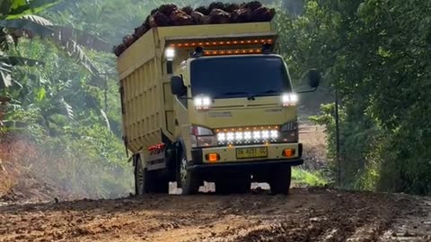 The truck driver was very steady on the sharp incline