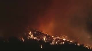 A fire tornado, known as a "firenado," develops as the Palisades Fire continues its spread