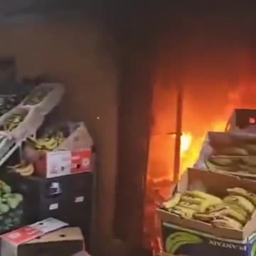 The usual suspect sets fire to a fruit shop in Spain and then runs away like a rat.