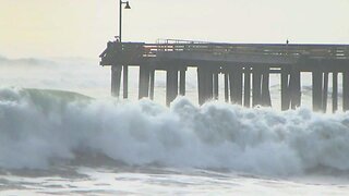 Huge waves tear through Santa Cruz wharf, sending debris into the ocean