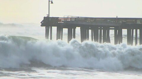 Huge waves tear through Santa Cruz wharf, sending debris into the ocean