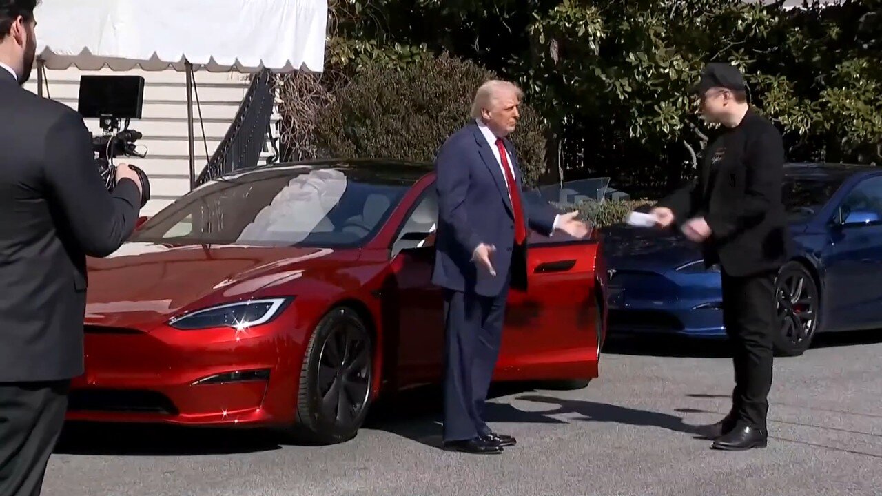 Tesla arrives at White House as Trump vows to buy one to support Musk