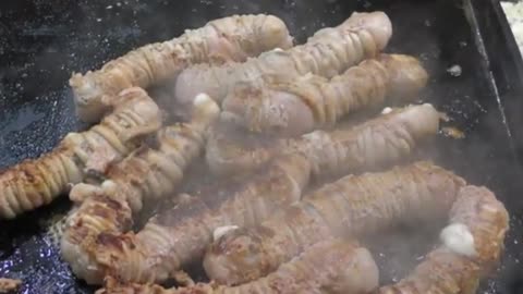 Unbelievable Irish Bratwursts on a Rotisserie: The Ultimate Street Food Experience in Italy!