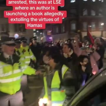 Terrorist sympathisers harass the police outside the prestigious London School