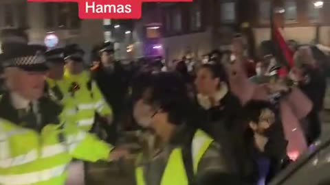 Terrorist sympathisers harass the police outside the prestigious London School