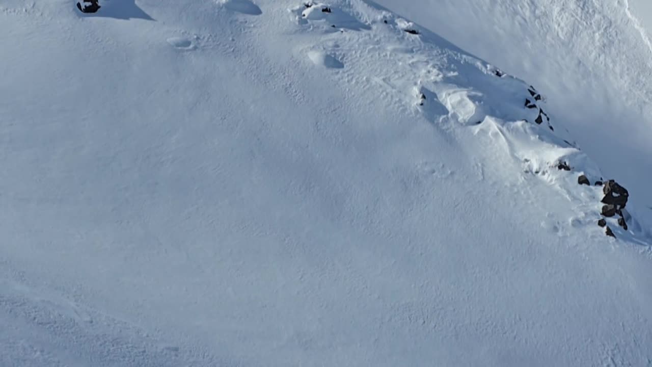 Skier Triggers Massive Avalanche