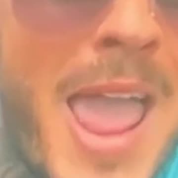 Ryan Wellings swigs Prosecco after being charged with manslaughter