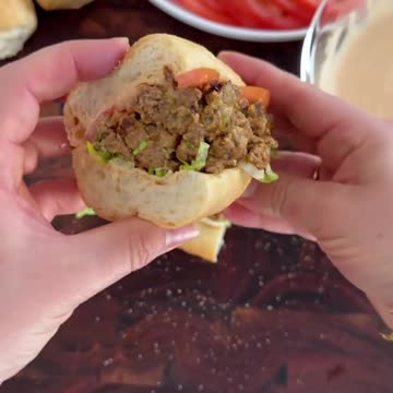 Chopped cheese on a grinder roll. onions and cheese.