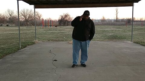 T-Style Isaac Kennedy talkin' with his partner Lil' Q at the park in West Helena, Arkansas.