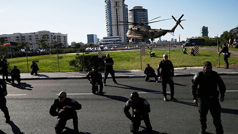 Crowd celebrates as helicopter brings four released hostages to hospital in Israel