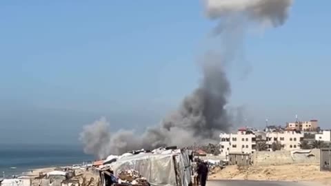 Israeli warplanes bombard Al-Nuwairi area, west of Al-Nuseirat refugee camp, in central Gaza Strip.