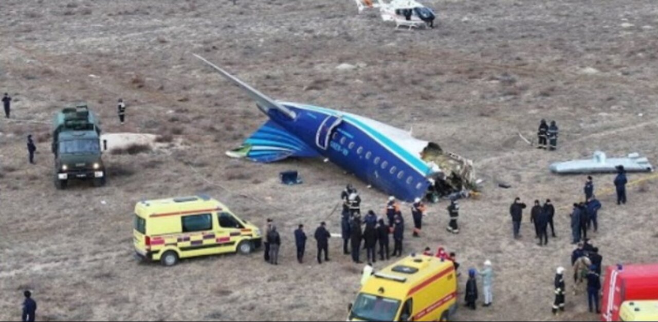 People at Grozny airport seek information about passengers on crashed plane in Kazakhstan