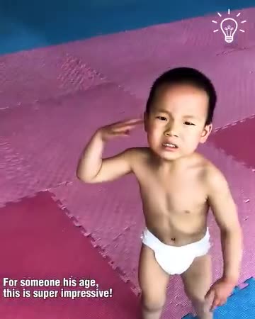 Doing flips is this little boy's specialty!