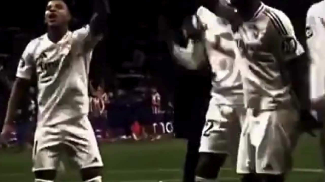 Real Madrid players dancing infront of Atletico fans