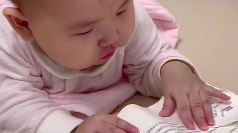 Baby crying after seeing a book