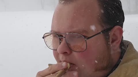 Cigar during a blizzard.