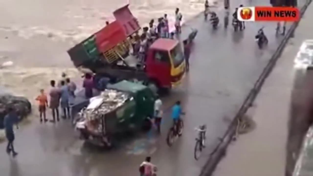 indians - jeets - dumping garbage trucks into the open water