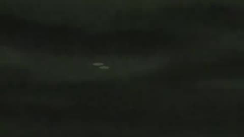 Alleged UFO Being Escorted