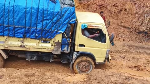 truck drivers struggle through extreme and steep roads