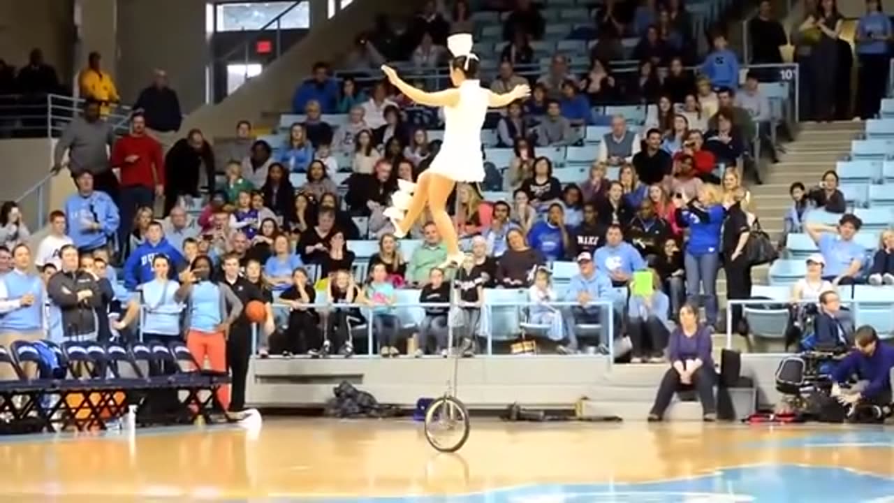 Amazing Circus Girl on ONE wheel Bicycle