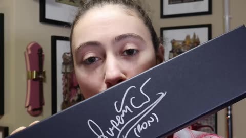 Rupert Grint Signs "Ron" On His WAND BOX.