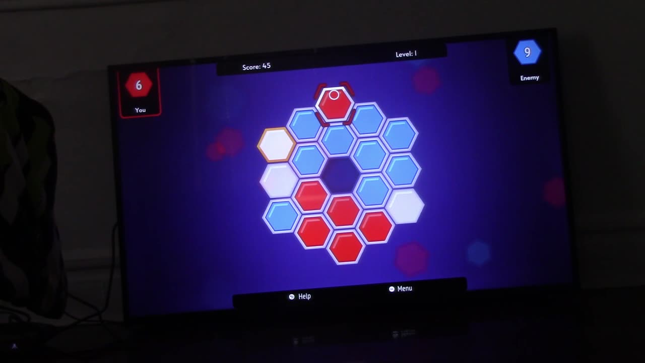 I'm playing ataxxagon indie game on atari vcs