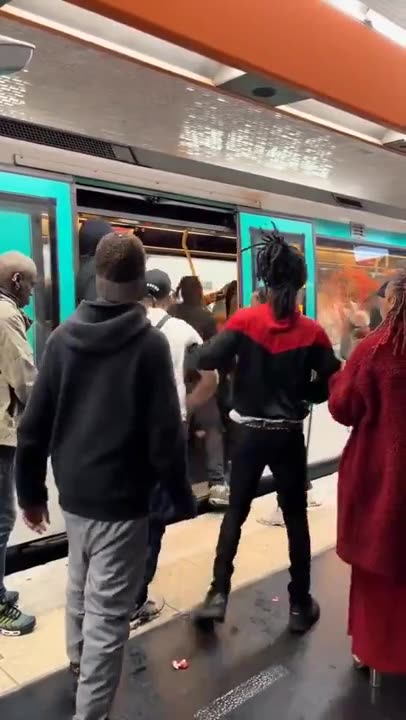 This is PARIS..... where are the whiteys-- Female officer-- LOLOLOL