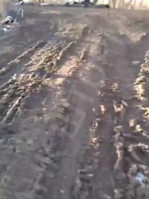 Russian Soldier Touring the Recently "Liberated" Village of Stelmakhovka