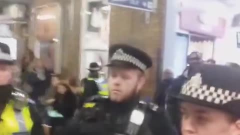 The British police ask him a question, he gets angry, plays the victim card and