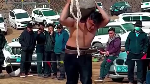 Super strong man carries a 280KG stone!.hd