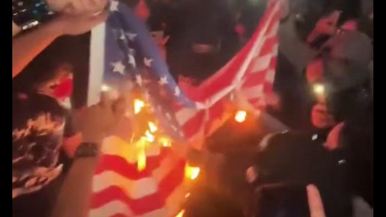 ICE protestors burn the American flag [Chant: Mexico! Mexico! Mexico!]