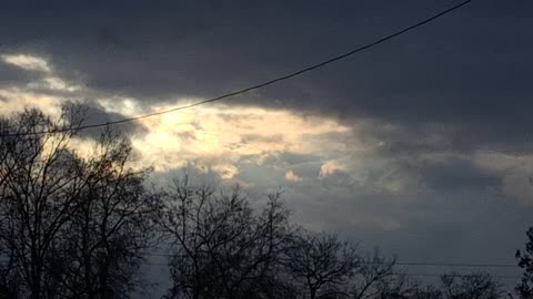 A layer of created material(fake clouds), in the atmosphere, sunblocking....