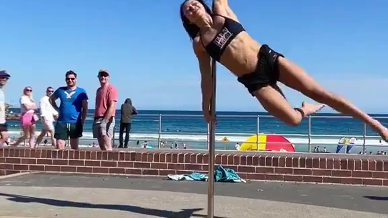 You Just Gotta Love A Woman Who Knows How to Work A Pole!