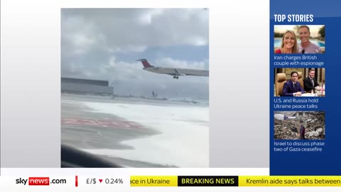 Dramatic video shows plane crashing and flipping over in Toronto