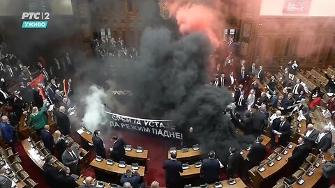 NOW - Chaos erupts in the Serbian parliament. WTF 😳