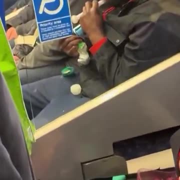 A man openly smokes crack on the tube in London, no one appears to care as