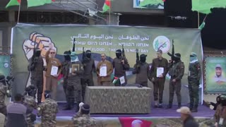 Hamas parades Israeli hostages on stage before their release