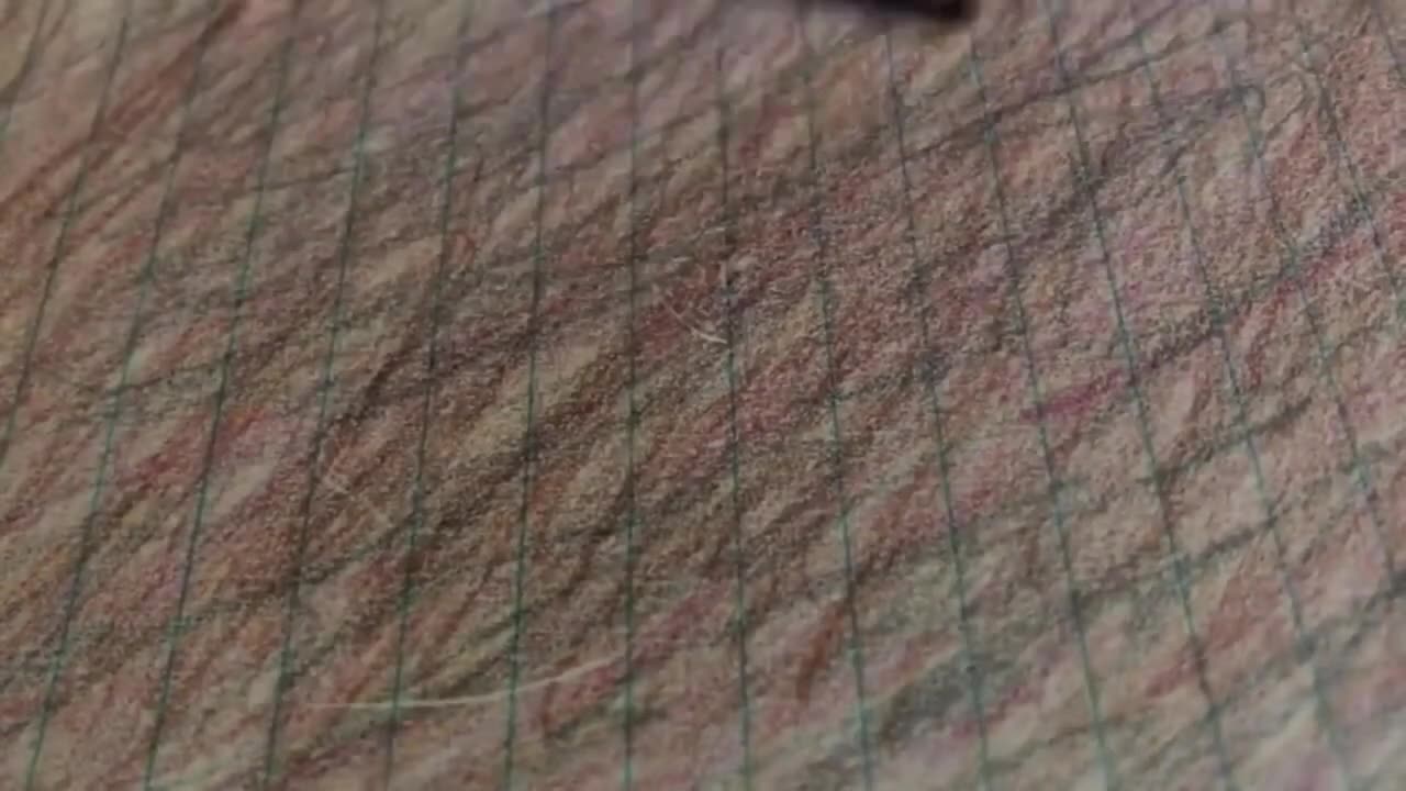 A virgin doodles with five different colored pencils before going to bed.