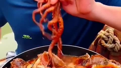 Chinese fishermen cooking and Eating fresh seafood