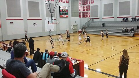 My daughter Allison posting up for two points during a high school basketball game