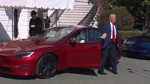 Trump gets into his brand new Tesla Model S!