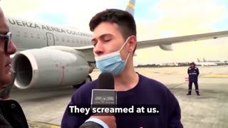 Deported illegal arriving back in home country STUNS reporter in first interview