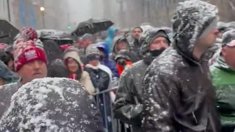 Trump supporters waiting in the snow to get into the rally